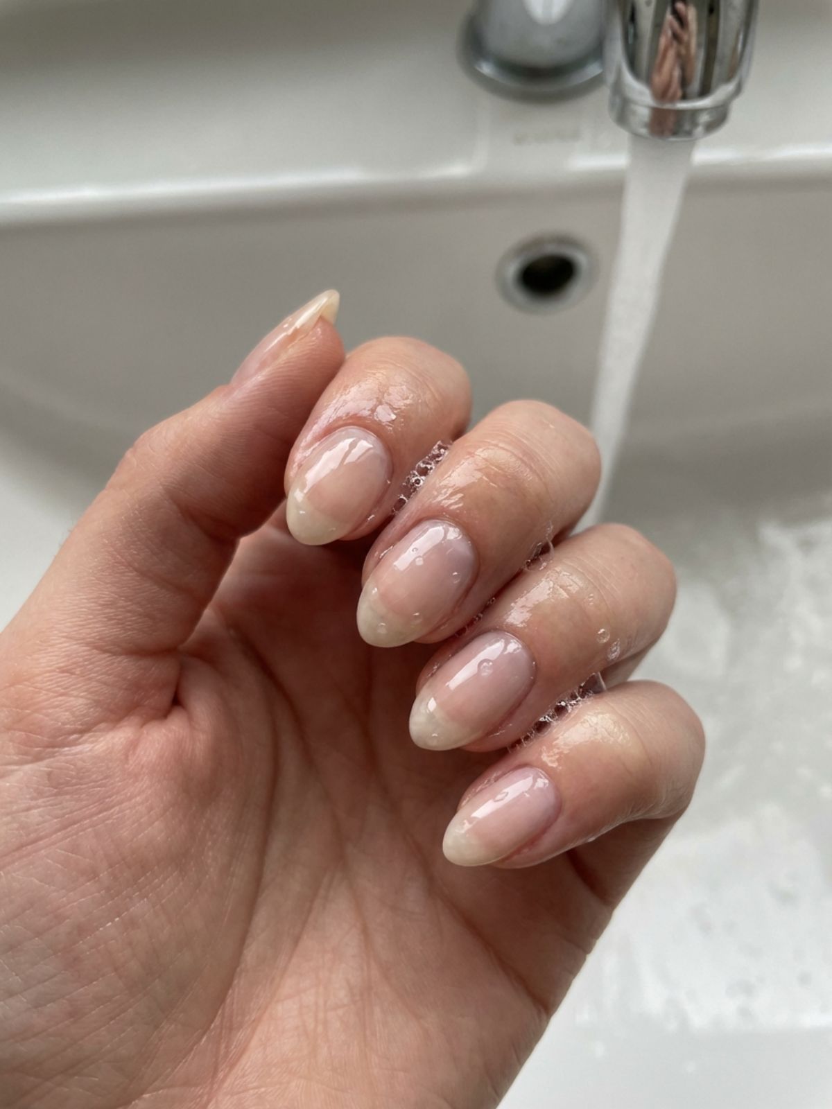 Minimal Nails for Summer Office Looks - The 'soap nail' trend focuses on ultra-clean, hydrated-looking cuticles.