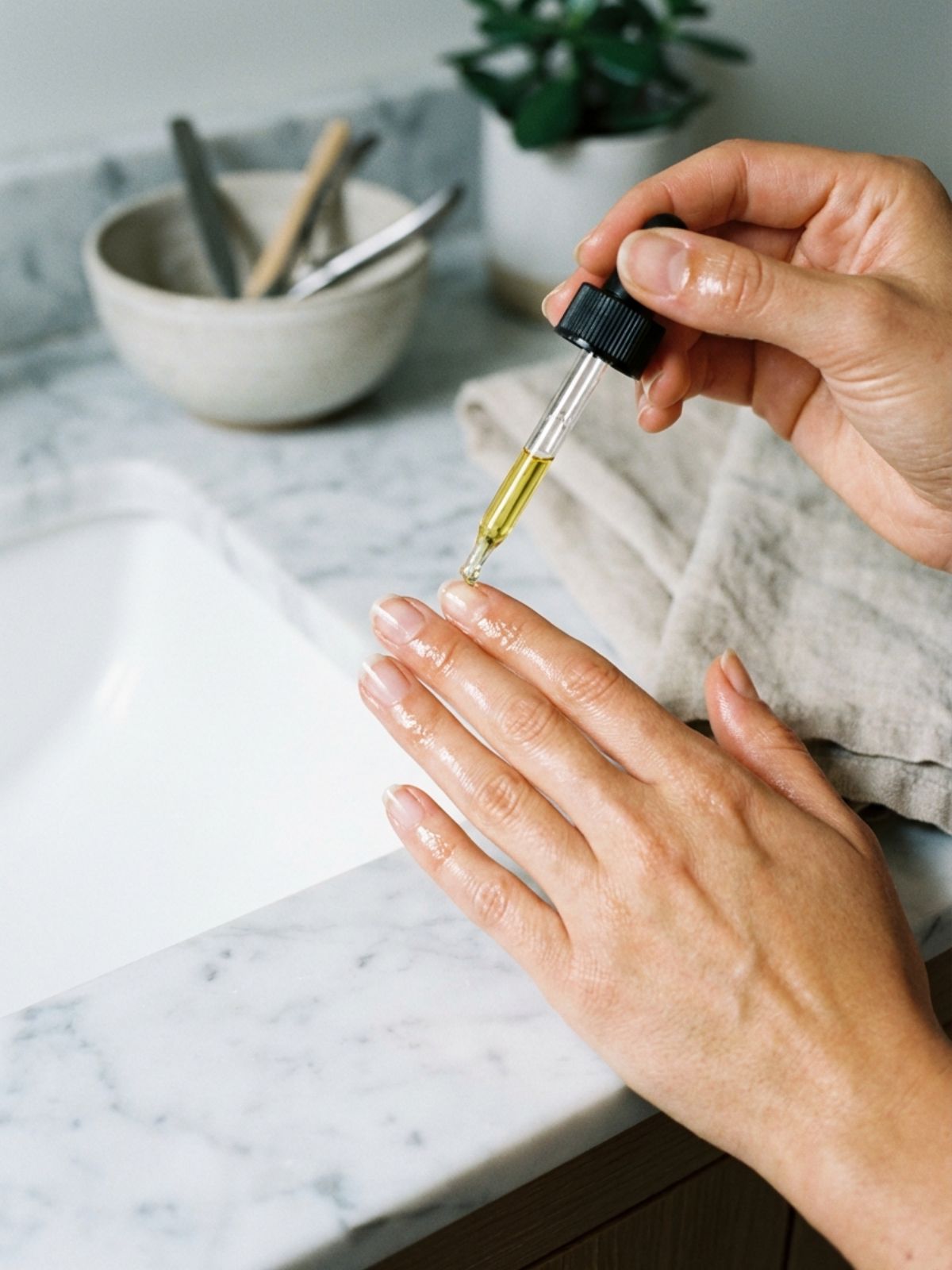 Natural Nail Designs for Work - Hydration is key: Daily cuticle oil is the secret to making sure your natural nail designs work long-term.