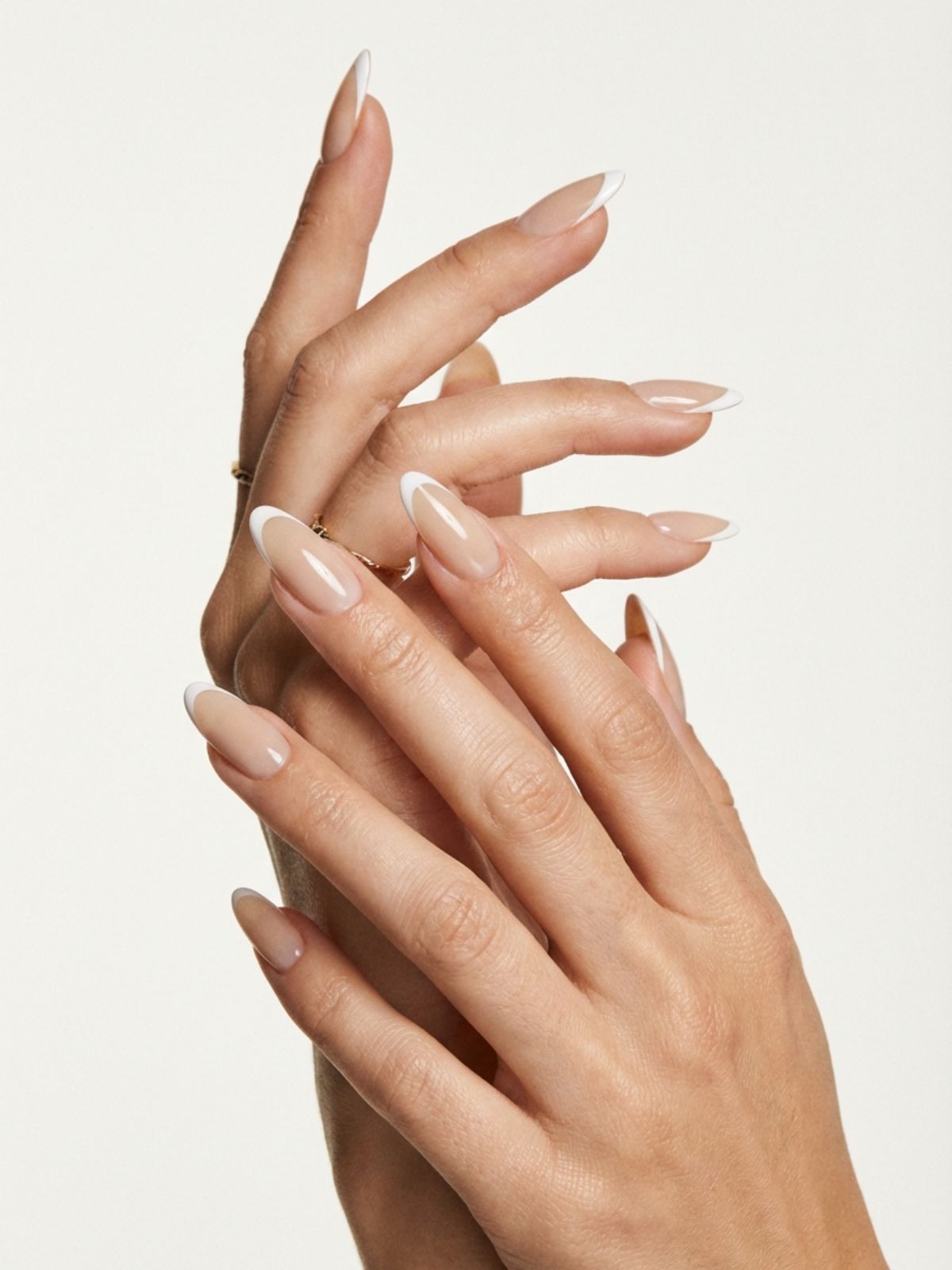 Minimal Nails for Short Fingers - Opt for a micro-French tip to define your nails without sacrificing visual length.