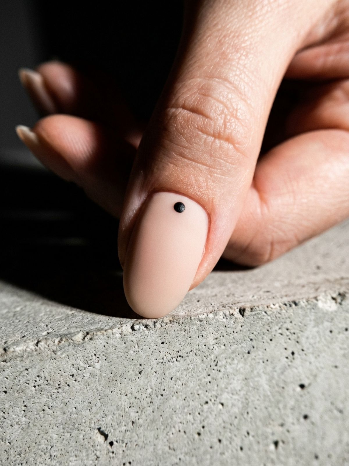 Elegant Minimal Nails for Professionals - A single dot is the easiest way to add an artistic touch to your nude mani.