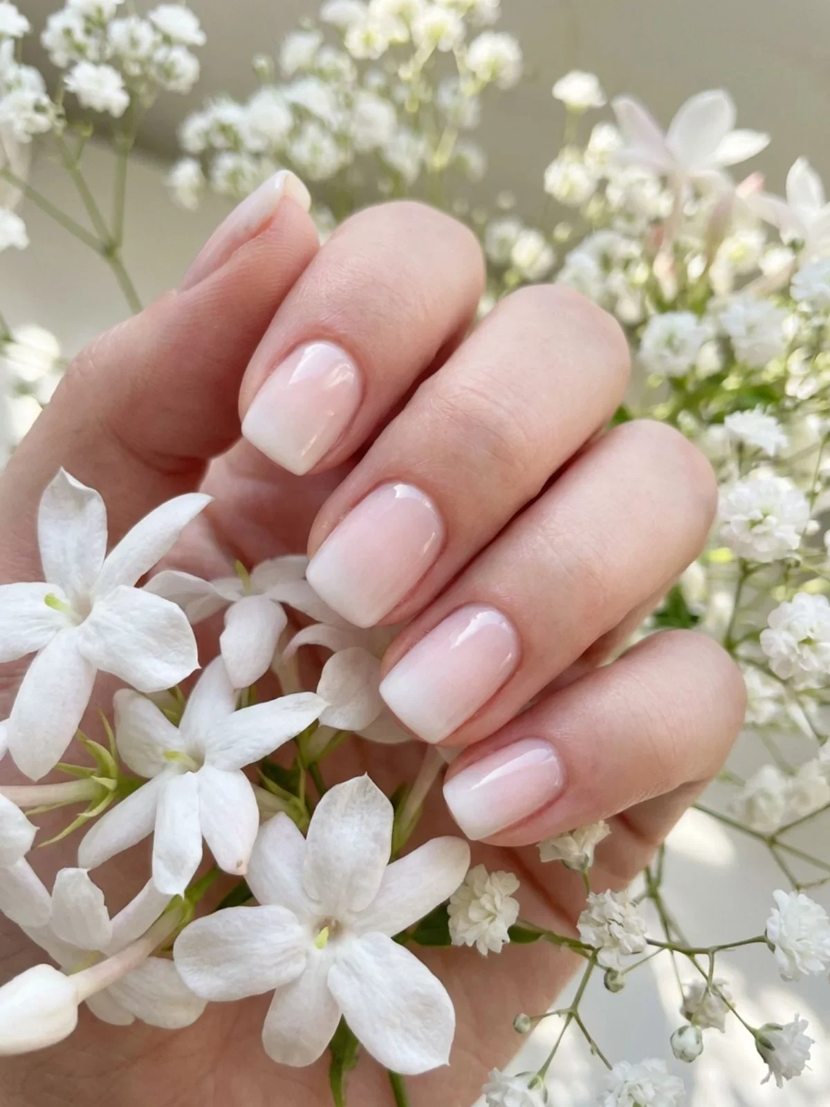 Minimal French Nails for Short Nails - The ombr&eacute; fade is a softer alternative to traditional minimal french nails short.