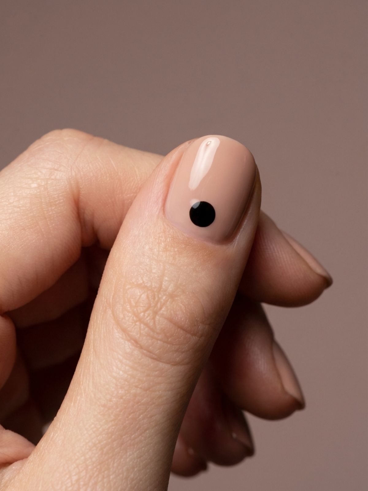 Minimal Nails for Summer Office Looks - A single micro-dot adds an artistic touch without overpowering the manicure.