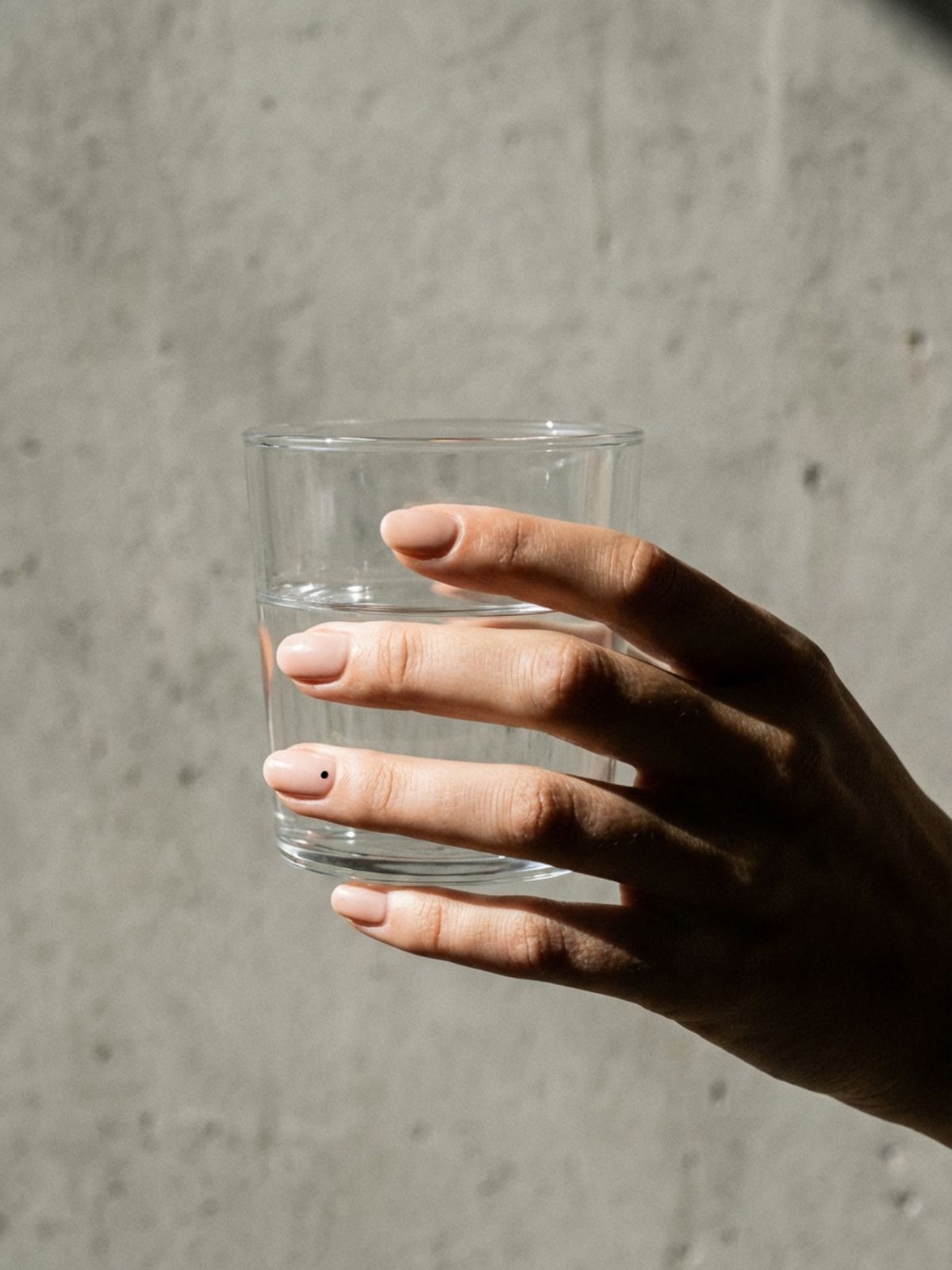 Natural Nail Designs for Work - Tiny details like a single dot keep things interesting while ensuring your natural nail designs work for conservative settings.