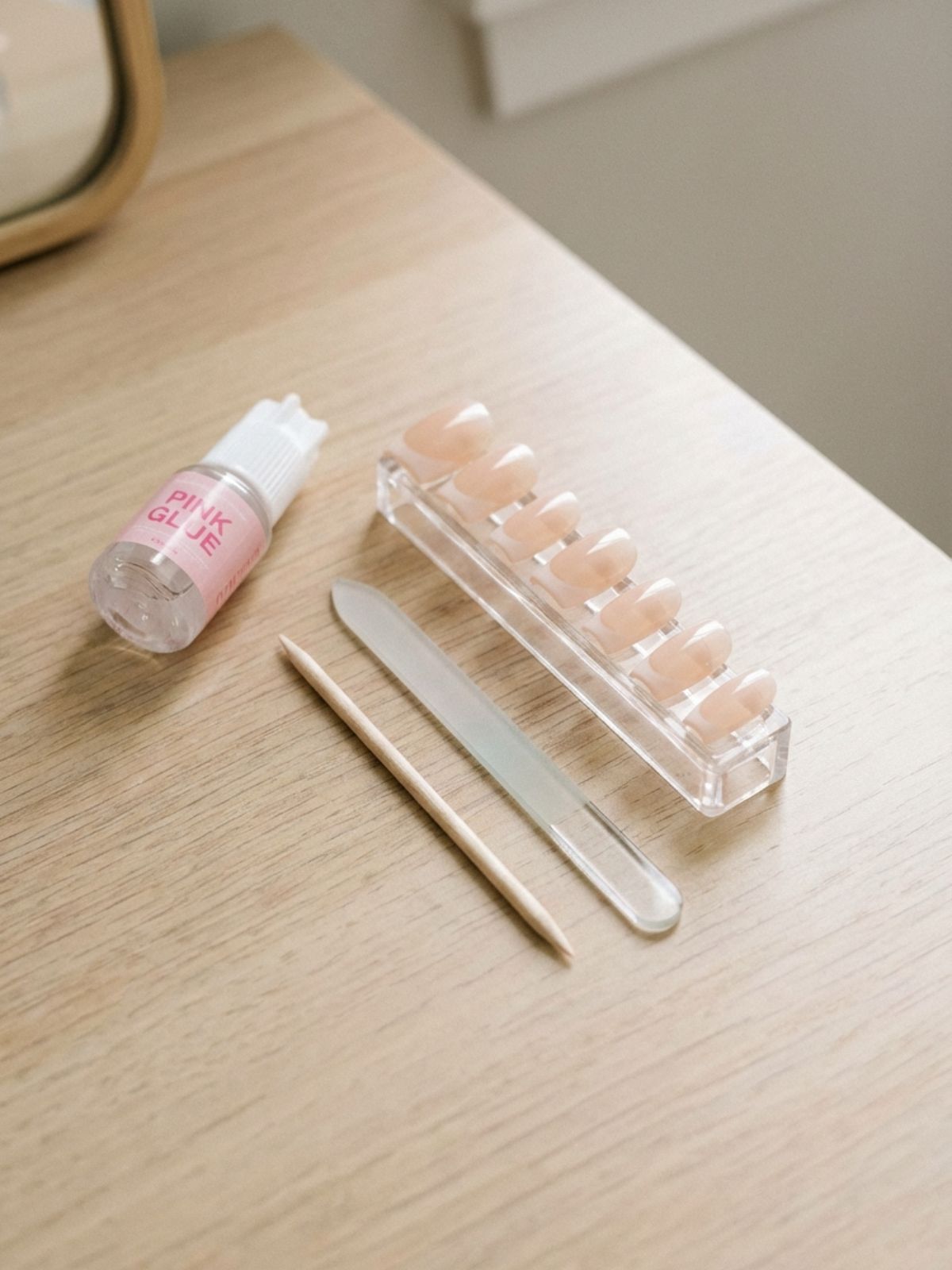 minimalist-nail-kit-essentials Minimal French Press-On Nails Review - The essential toolkit for achieving a salon-quality minimal french manicure at home.