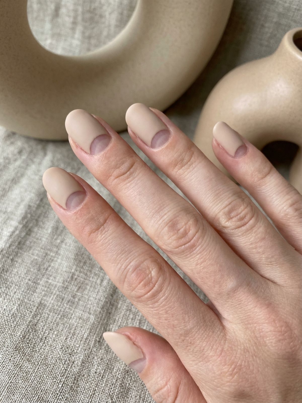 Minimal Nails for Busy Women - Negative space designs make regrowth invisible, extending the life of your manicure.