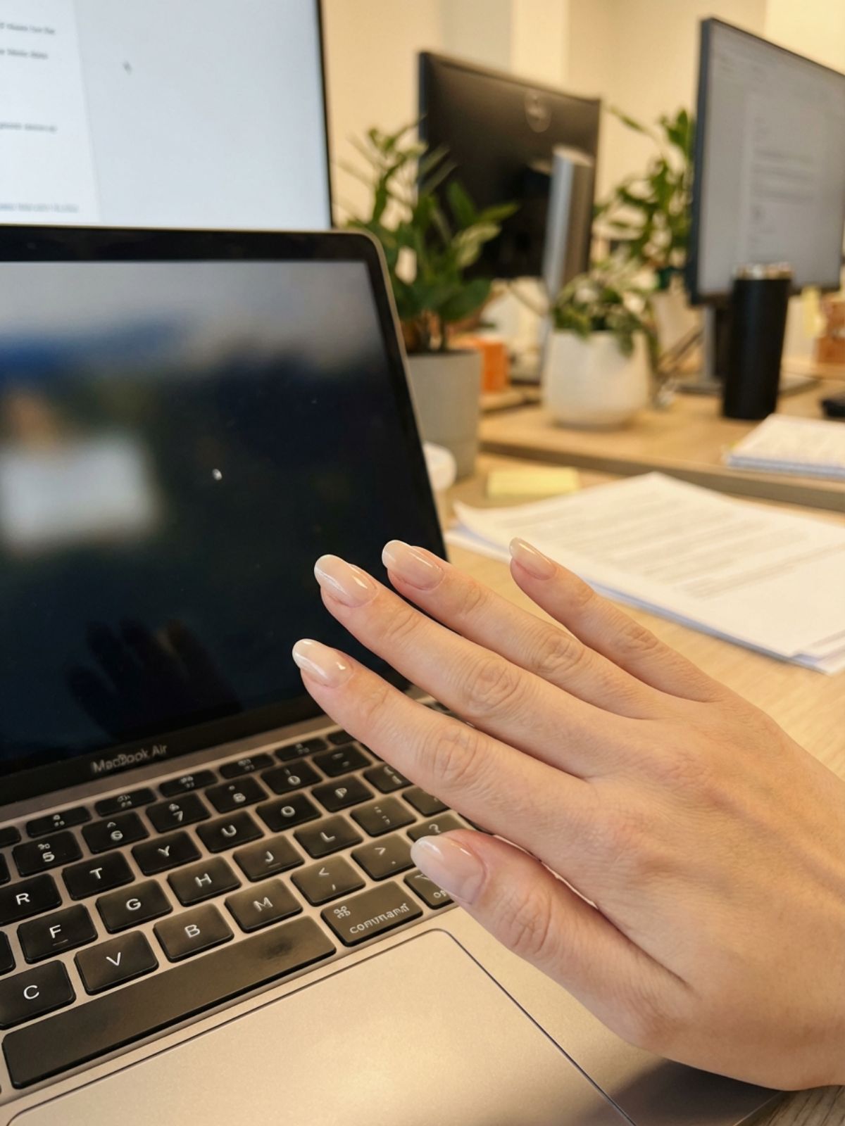 Minimal Nails for Summer Office Looks - Sheer nude shades offer a low-maintenance solution for busy professionals.