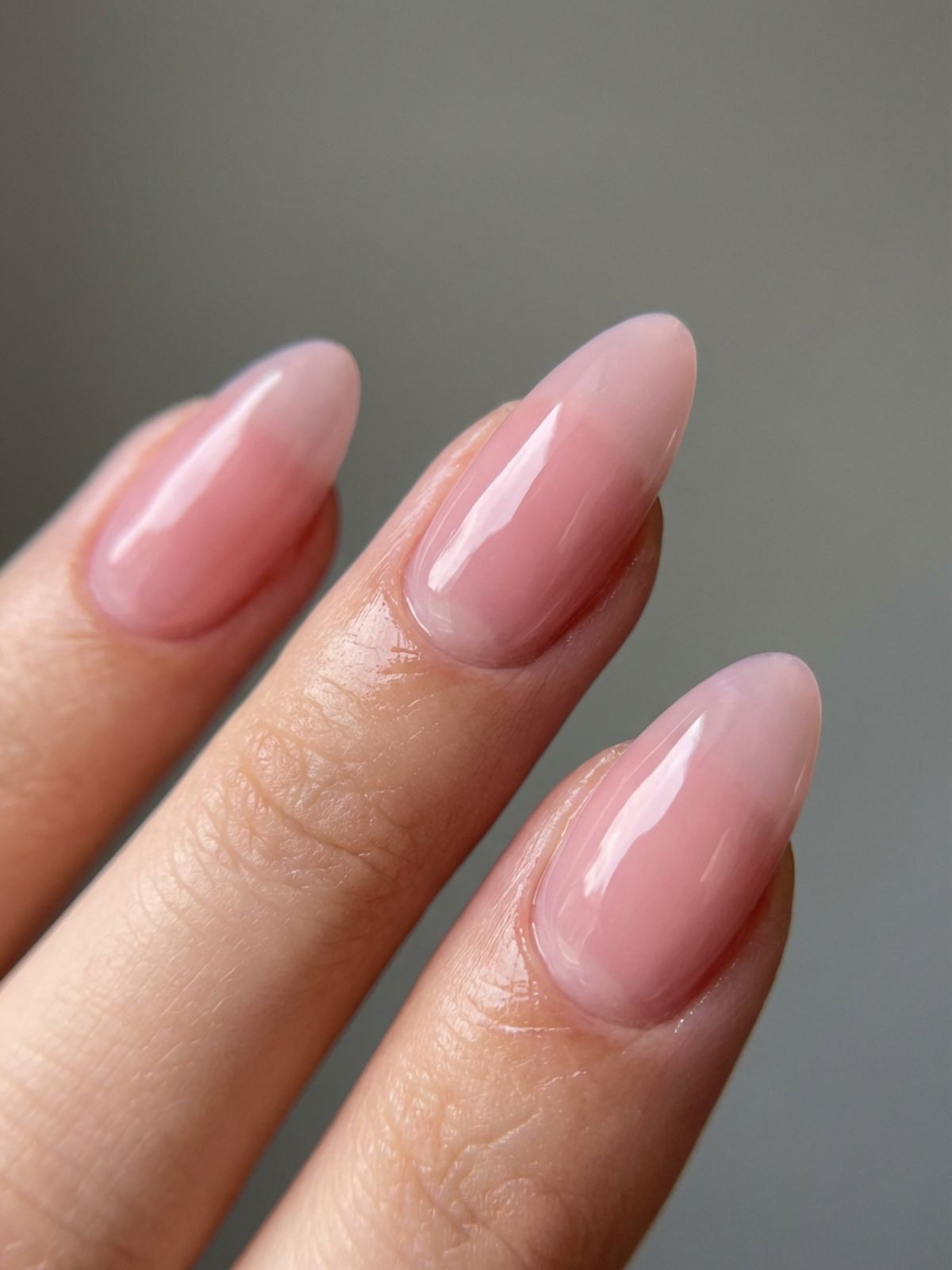 Minimal Nails Without Nail Art - Sheer pink builder gel creates a healthy, 'your nails but better' finish.