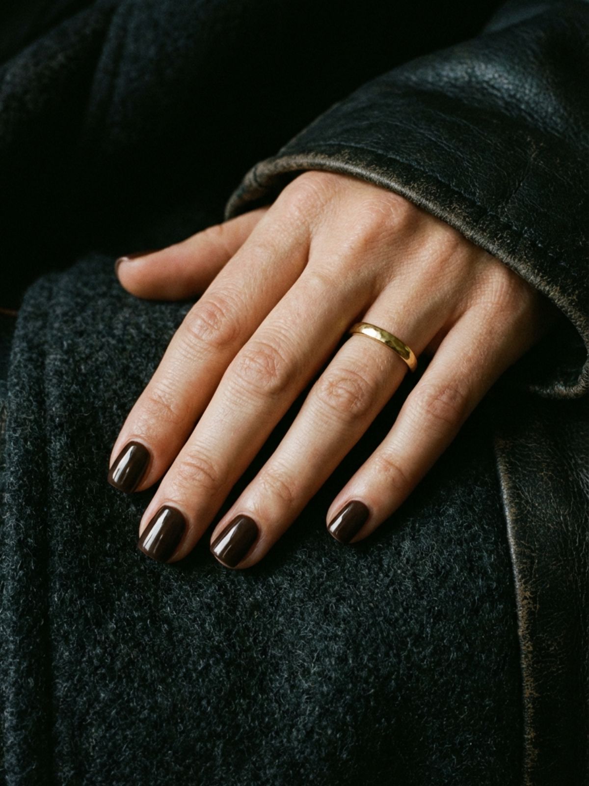 Minimal Nails Without Nail Art - Deep espresso tones provide a sophisticated, moody alternative to nude minimalism.