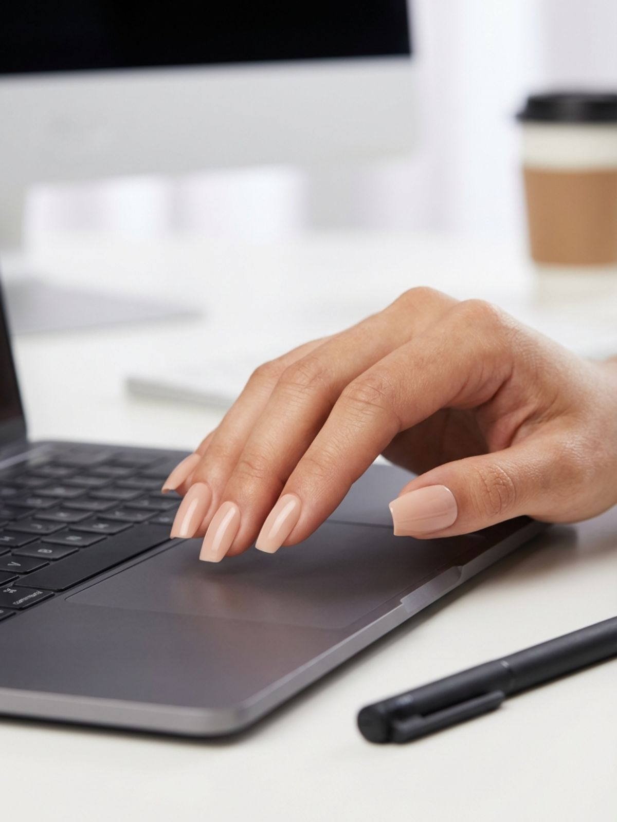 squoval-acrylic-press-on-nails-office Minimal French Press-On Nails Review - Acrylic-infused squoval nails provide the durability and polish needed for a professional environment.