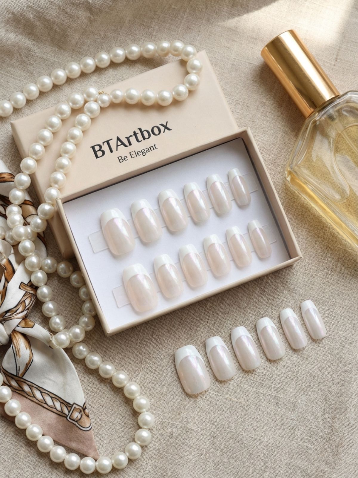 Best Minimal Press-On Nails for Winter - An elevated take on the classic French manicure for winter events.