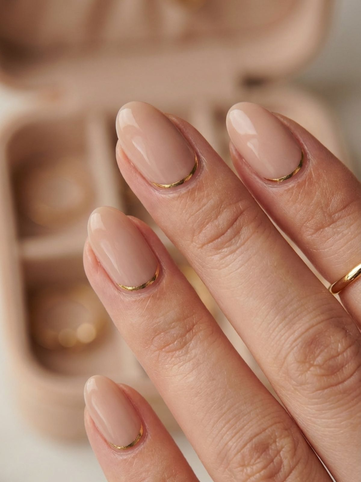Minimal Nails for Content Creators - Frame your nail bed with a metallic 'cuff' for a jewelry-inspired touch.
