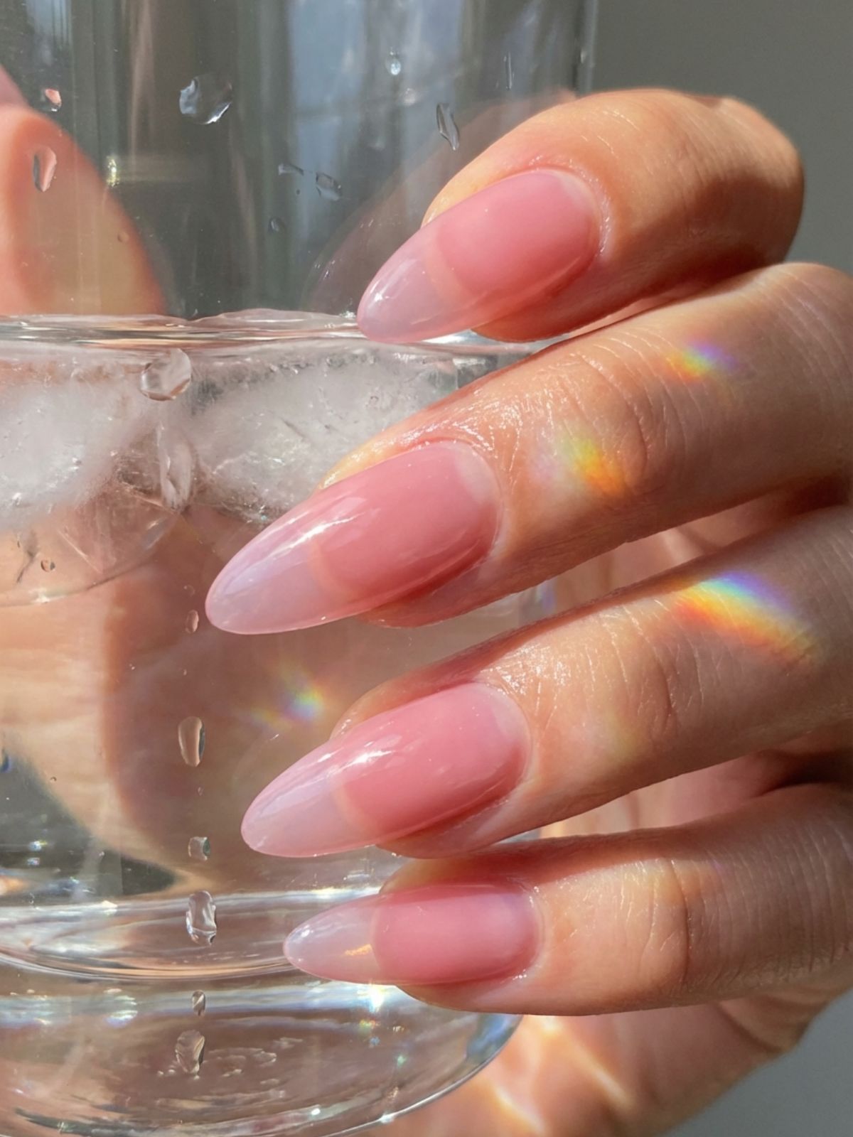 Minimal Nails for Business Trips - Lip gloss nails use a jelly finish to give your hands a youthful, hydrated glow.