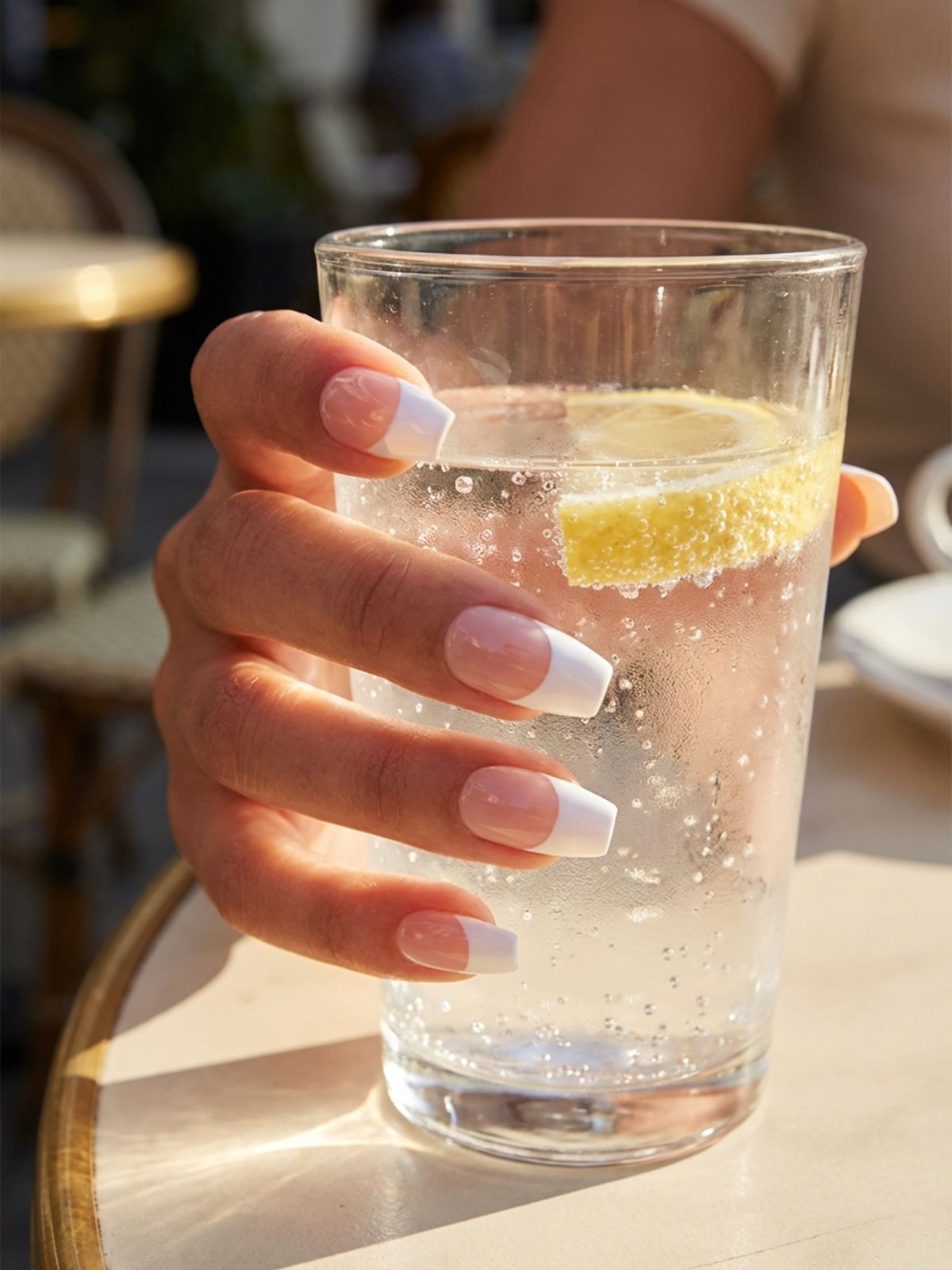 Best Press-On Nails for Travel Bags - A medium coffin shape adds instant elegance for vacation dinners or events.