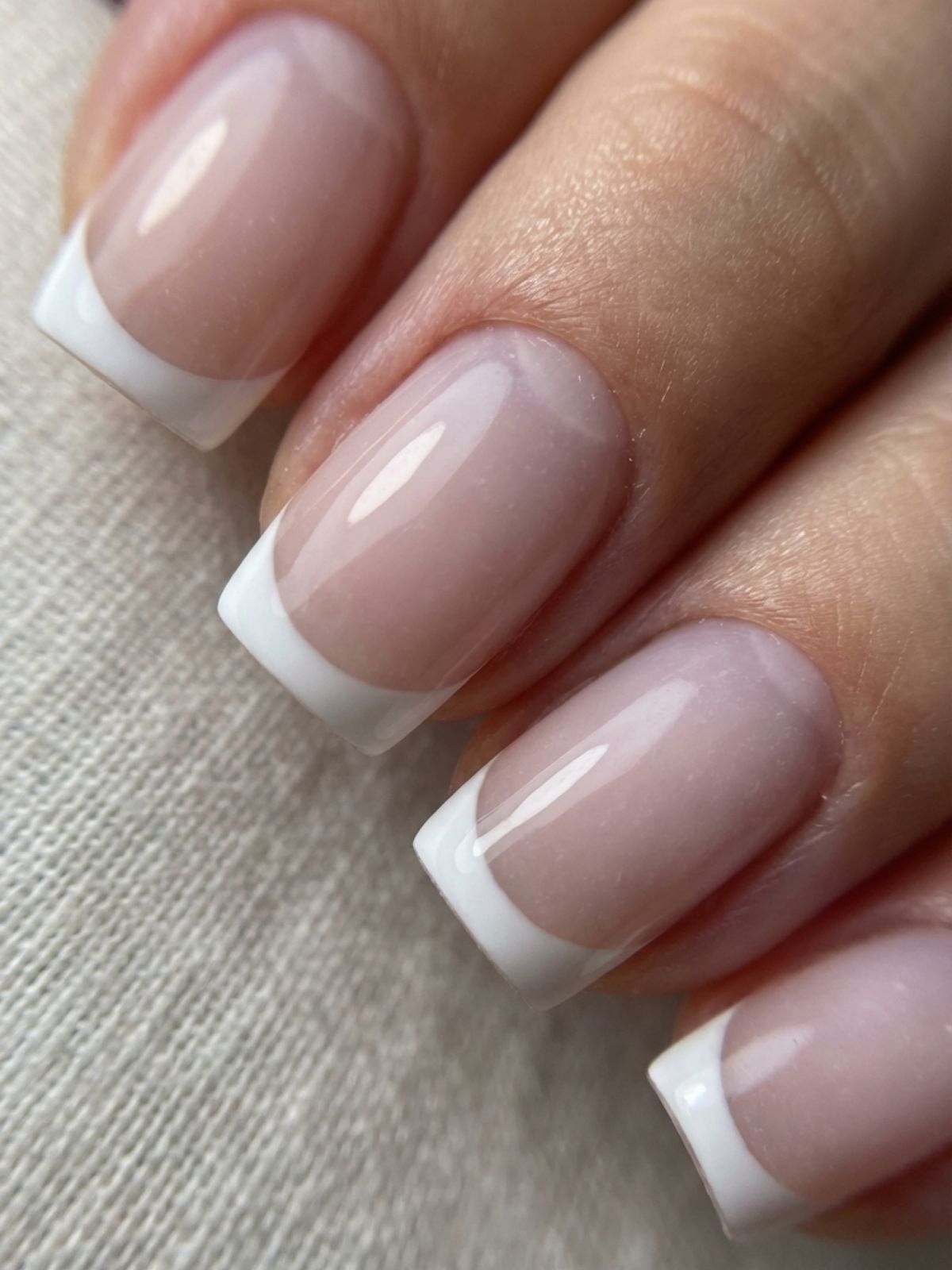 Minimal Nails for Business Trips - Ask for a micro-French tip for a modern, subtle twist on the classic office manicure.
