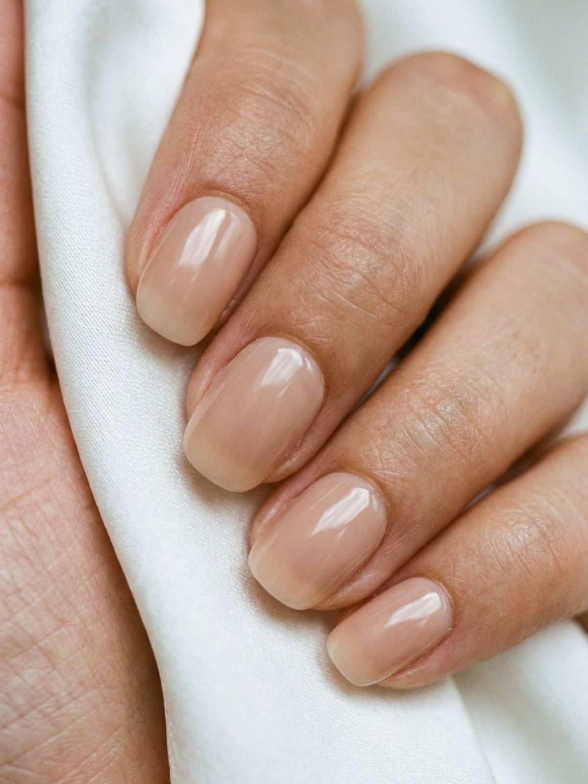 Best Minimal Press-On Nails for Winter - A seamless cuticle fit is key to the natural minimal look.