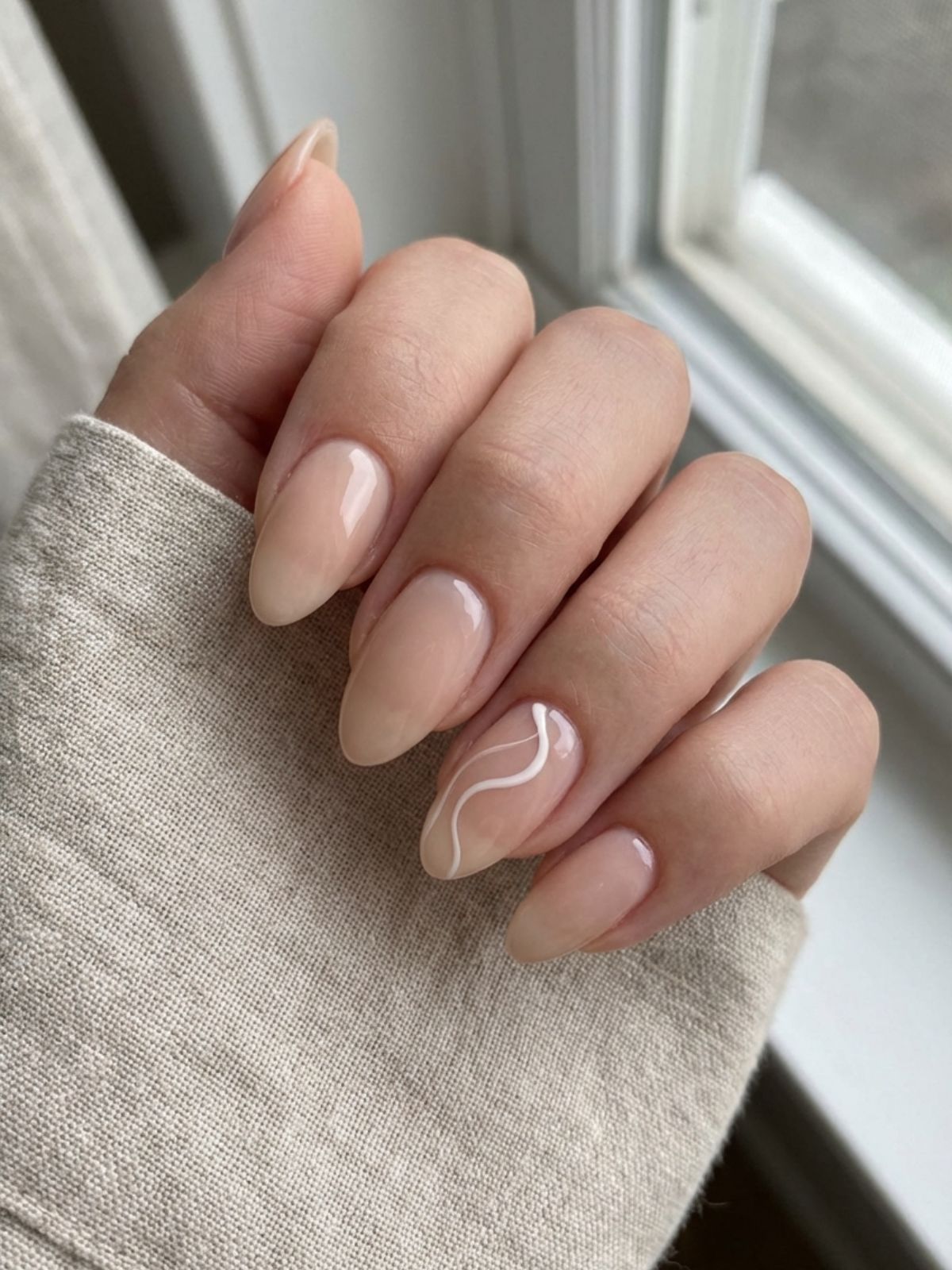 Minimal Nails for Bridesmaids - Delicate negative space swirls add personality without clutter.