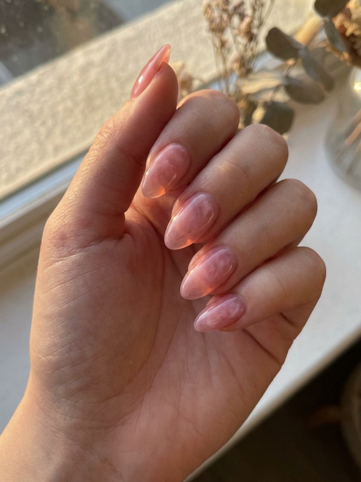 Minimal Nails for Wedding Guests - Jelly polish creates a translucent, syrupy depth that looks hydrated and youthful.
