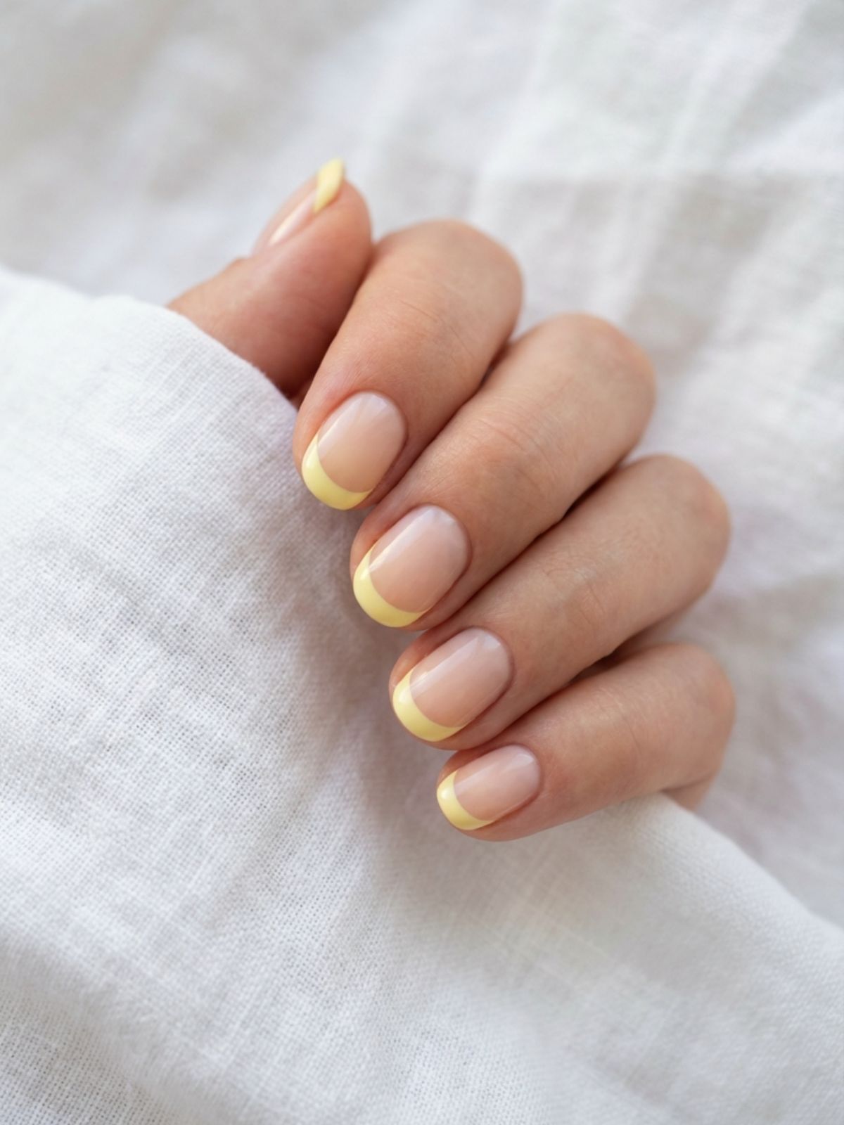 Best Minimal Press-On Nails for Spring - The Glamnetic French Butter set brings a subtle pop of spring color to a minimal style.