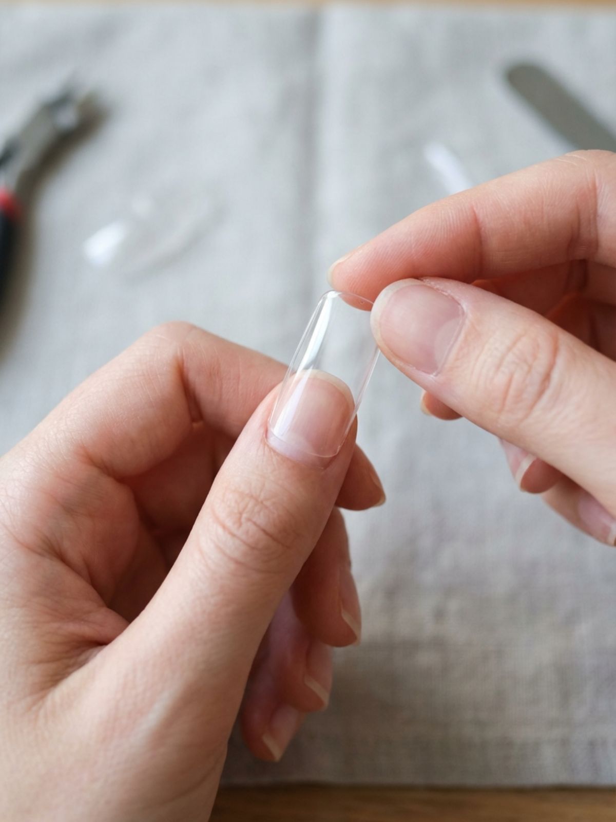 Press-On Nails Buying Guide - Correct sizing is crucial; the tip should cover the nail plate without touching the surrounding skin.