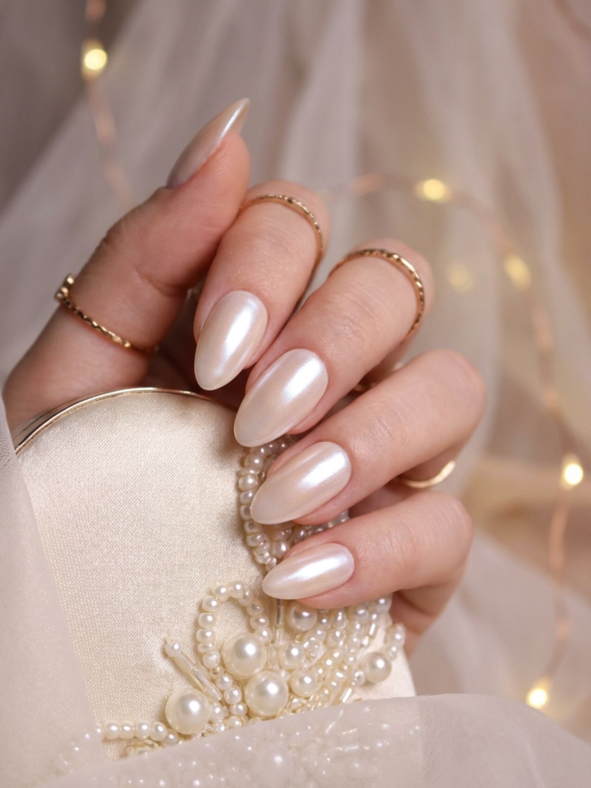 Minimal Nails for Wedding Guests - Vanilla chrome offers a warmer, softer alternative to the silver glazed donut trend.